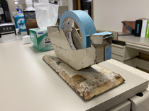 This multimillion dollar hospital lab I work in with huge analyzers and new equipment manufactured months ago has a tape dispenser from - held up by a toothpickstir stick