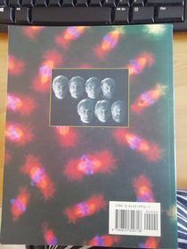 This photo of the authors on the back of my Essential Cell Biology book