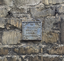 This plaque in the historic English town Stamford It was about  feet up