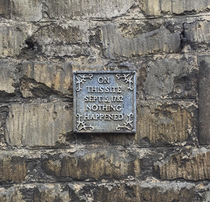 This plaque in the historic English town Stamford It was about  feet up