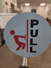 This pull sign for a door