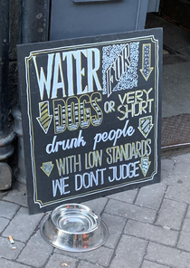 This sidewalk sign outside a pub in Edinburgh Scotland