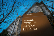 This sign for the IRS looks like a Cards Against Humanity card