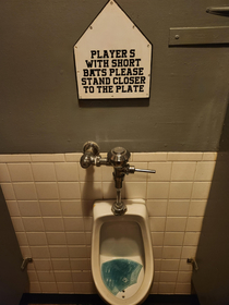 This sign in the mens bathroom