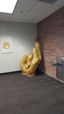 This statue in my local library looks like it just fingered a butthole