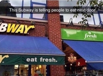 This subway is telling people to eat next door