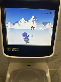 This urninal in California has a game on it Aim your pee to steer the guy and collect penguins