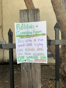 this very angry yet delightfully colorful sign posted in my neighborhood