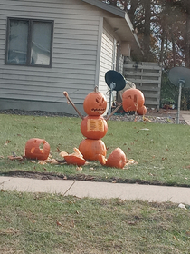 This victorious pumpkin creature in my neighborhood 
