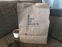 to-go bag from Dicks Primal Burger in Portland OR