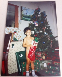 To the kid who didnt have time for pants in his childhood Christmas photo This isnt even my house