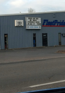 Took this picture of the building across from my moms office First time seeing a sign like this in the wild