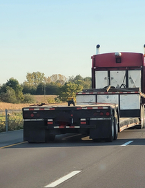 Tractor Trailer carrying a toy truck