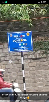Traffic awareness sign in my city looks like it says follow someone home