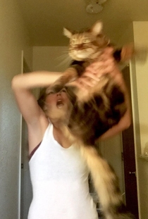Tried to take a cute picture with my cat Jynx
