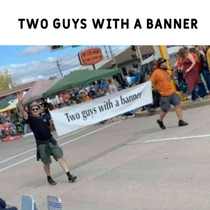 Two guys with a banner