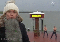 Two shirtless German guys videobomb a live news report 