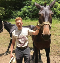 Tyler Childers wearing a shirt of Post Malone wearing a shirt of Tyler Childers