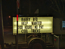 volunteer firefighter sign in a small town