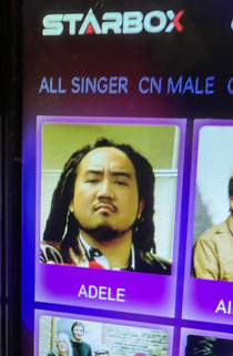 Was at a karaoke bar and it took me so long to find Adele because this was their photo of her