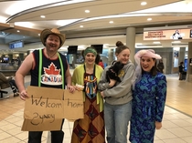 We decided to embarrass our daughter at the airport after  months away we dont normally dress this way
