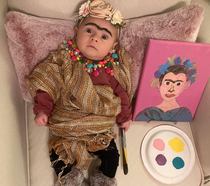 We dress my infant daughter as Frida Kahlo