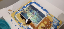 We threw a coworker a retirement party with a photo cake No one would eat the dog