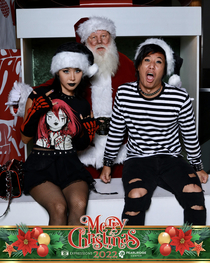 Went to take photos with Santa looks like he was having a rough day