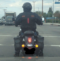 Whoever designed this biker jacket with signal lights is a pure genius
