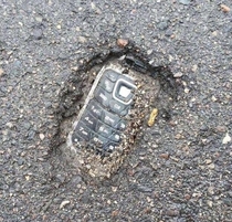 Whoso pulleth out this phone of this stone is rightwise king of the flip phones
