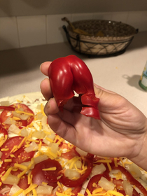 Wife was making a pizza for dinner last night and called me over to help her with something Walked into the kitchen to see this