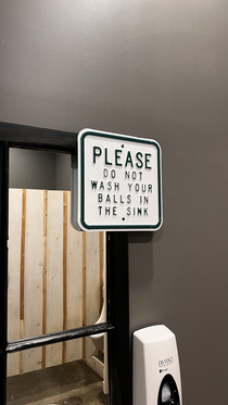 wild bathroom sign
