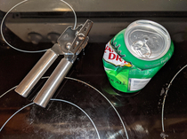 Woke up this morning and found this on the stove I guess my wife wanted a Ginger Ale last night but the can didnt want to share