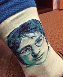 You decide are these socks supposed to be John Lennon or Harry Potter