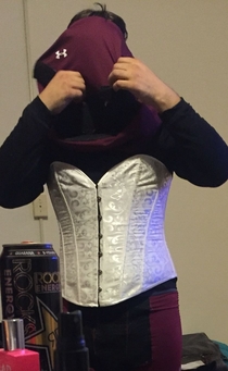 You guysmy male roommate asked me to borrow a corset to better fit into his Daredevil cosplay costume and I snuck this picture