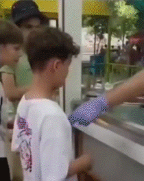 Young boy completely owned Turkish ice cream guy