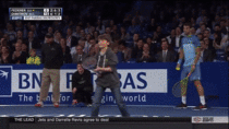 Young tennis fan hits lob over Federer